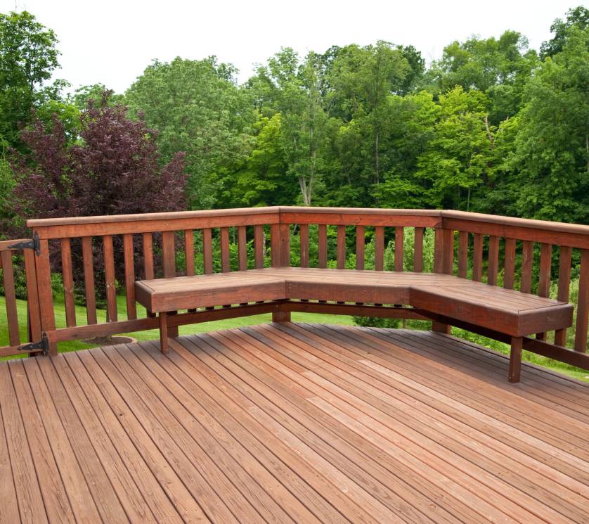 Redwood,Stained,Deck,Boards,With,A,Bench,Seat,Overlooking,The